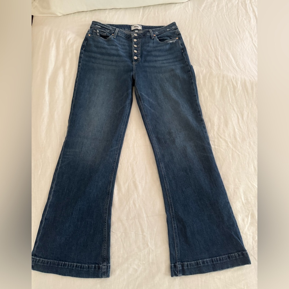 PAIGE Lennah Jeans with exposed button fly. Wide leg and tailored cuff.